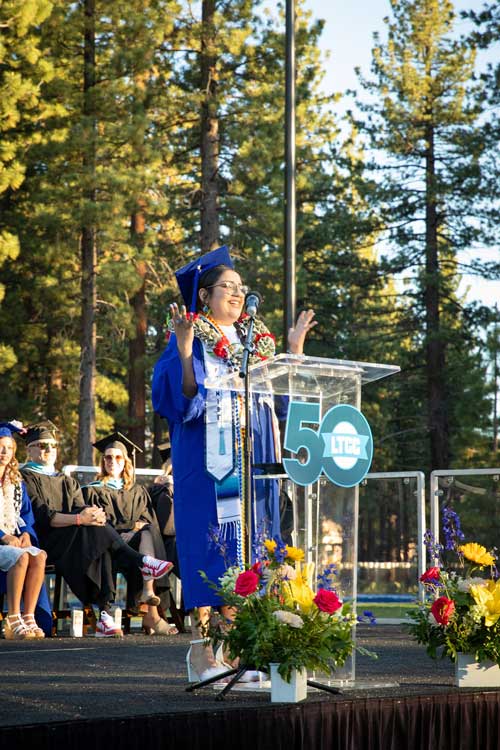 Student speaker delivering closing remarks